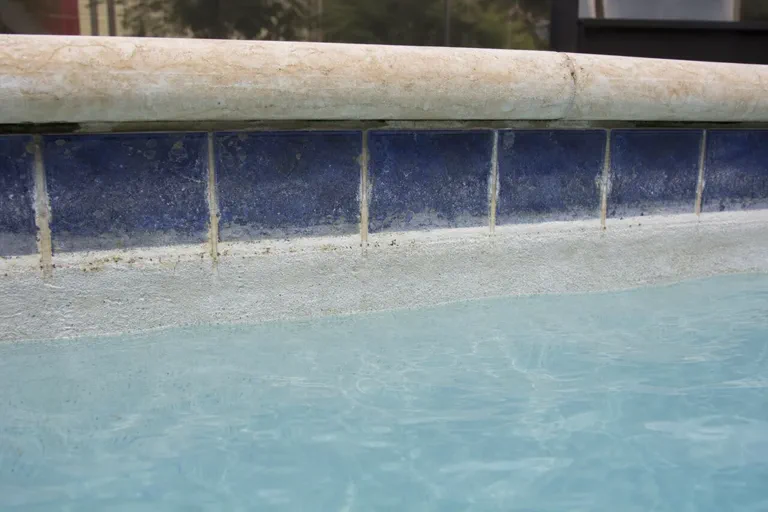 Brevard pool plaster and waterline wear close up